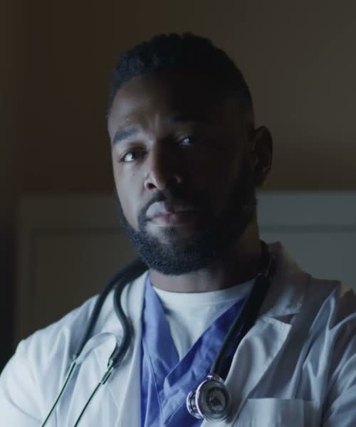 On the right spread, a male doctor looks ahead focused.